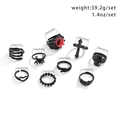 9pcs matte black gothic ring set with red eyeball gemstone and mixed spooky motifs - Black