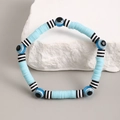 Pulsera de cuentas Heishi azul cielo con rayas blancas y negras y ojo de la suerte - Estilo Multicolor 2