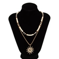 Layered men's necklace featuring wood beads, coconut shells, and a gold sun pendant - Gold 06274