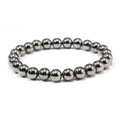 Detailed close-up of dark grey metallic beads with a high-gloss polished mirror finish - Style 3 (8mm CCB)