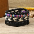 Ensemble de bracelets bohèmes avec perles multicolores et tissage sur fond de bois naturel - Style Brillant Perles en Bois Noir (5)