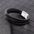Détail d'un bracelet multicouche en cuir tressé avec fermoir magnétique en argent - 21cm Cuir Noir Boucle Argentée