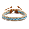 Detailed close-up of handmade woven hemp rope bracelet with light blue fiber core - Blue Style