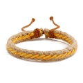 Close-up of handmade braided hemp bracelet with adjustable slip knot in orange and tan - Yellow Style