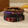 Set de 4 bracelets style bohème avec perles en bois et cuir tressé sur bois - Style Tressé Multicolore Violet (12)