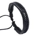Detail of black leather fishbone braided bracelet with adjustable drawstring closure - Black