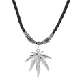 Detail of silver leaf pendant on black woven leather cord with vintage metal beads - Maple Leaf
