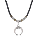 Bohemian style choker featuring a silver crescent horn pendant with tribal engravings - Black