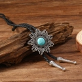 Western vintage bolo tie with turquoise sunflower metal pendant and black braided rope - Sun Flower Style (RH668-1)