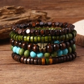 Boho-Mehrlagen-Armband-Set mit Holzperlen, Türkisstein und antikem Schmetterling-Anhänger - Olivgrüner Schmetterling Layered Stil (3)