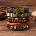 Détail de bracelets multicouches bohèmes avec arbre de vie et pendentifs papillon - Ensemble Arbre de Vie + Papillon