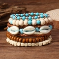 Détail de bracelets bohèmes multicouches avec perles de turquoise, perles de bois et coquillages - Style Tressé Turquoise Coquillage Naturel (6)