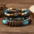 Dettaglio del set di braccialetti multistrato bohémien con pietre turchesi e legno - Stile Perline Distanziatrici Loto (6)