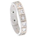 Detail of white leather punk bracelet with silver star cutouts and adjustable snap buttons - White