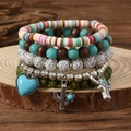 Mehrlagiges Boho-Armbandset mit Herz- Kaktus- und Stierkopfanhängern für Damen - Mehrfarbig