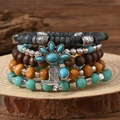 Set de pulseras bohemias multicapa de madera con flor turquesa y colgante de bota - Multicolor