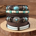 Set bracciali multistrato in pelle stile boho con pietre turchesi su legno - Multicolore