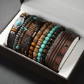 Detailed view of bohemian beaded bracelet set featuring leather bands and feather charms - Bull Head Print Style (03)