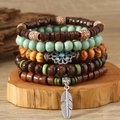 Ensemble de 5 bracelets bohémiens en perles de bois pour hommes avec pendentif plume - Ensemble de 5 pièces Fleur