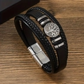 Detail of men's multilayer braided leather bracelet with Tree of Life charm and magnetic clasp - Black