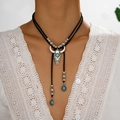 Western bolo tie featuring a silver bull skull pendant with turquoise on white lace - Necklace (RH811)