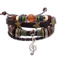 Detail of vintage multilayer leather bracelet with musical note and bronze star charms - Brown