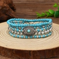 Five-piece bohemian turquoise beaded bracelet set with vintage floral metal charms - Blue Multilayer Beaded Set