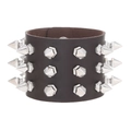 Macro detail of deep brown leather punk bracelet with three rows of silver metal studs - Triple Row And Single Row