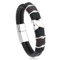 Close-up of woven leather men's bracelet with silver X-shaped metal charm and magnetic clasp - Black and Brown