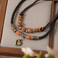 Bohemian multilayer woven heart pendant necklace with vintage brown beads and charms - Hollow Heart Pendant Necklace