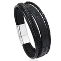 Macro detail of men's leather bracelet showing embossed cross and silver magnetic clasp - Black Leather Silver Clasp