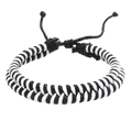 Detailed macro of black and white hand-woven double-strand bracelet with adjustable knot - Classic Black White Style (03)