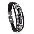 Vintage meerlaagse leren armband met g-sleutel hanger en een metalen sluiting - Bruin