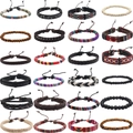 Set di 24 braccialetti tribali boho con cordini in pelle intrecciata e perline di legno - Multicolore