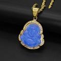Macro detail of gold-plated Buddha pendant with blue stone and sparkling zircon frame - Blue