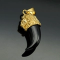 Golden stainless steel lion head pendant with curved black resin tusk on reflective background - Gold Black Tooth (No Chain)