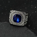 Macro detail of men's square blue gemstone ring with pave white diamonds on silver metal - Steel + Blue Stone