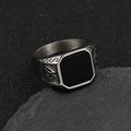 Detail of vintage Viking steel ring with rectangular black stone on black slate - Steel Black Agate