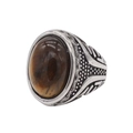 Macro detail of oval tiger eye stone set in vintage engraved stainless steel ring - US 7 / Silver Tiger Eye