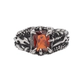 Detail of retro dragon claw ring with red gemstone and textured scales engraving - US 7 / Red