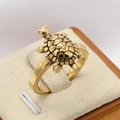 Vintage golden turtle ring in stainless steel with realistic shell texture on display - US 7 / Gold Small
