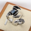 Retro punk scorpion ring in stainless steel with a blue gemstone on a beige display - US 7 / Blue Rhinestone