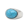 Macro detail of silver stainless steel ring featuring an oval turquoise stone with black veins - Steel Blue Turquoise