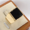 Men's square black onyx ring with gold-plated finish on a luxury jewelry display - Gold Black Stone