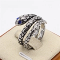 Anillo de serpiente plateado vintage con ojos de gema azul y textura de escamas - US 7 / Ojos Azules Acero