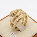 Anillo de serpiente dorado vintage con triple espiral y detalles de ojos de cristal - Oro Ojo Blanco