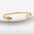 Bracciale a serpente vintage in acciaio al titanio dorato con texture a scaglie - Oro