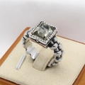 Vintage silver ring featuring a large rectangular smoky gray crystal with textured band - Steel Tone Khaki Rhinestone