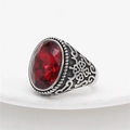 Vintage oxidized silver ring with large oval red gemstone and intricate floral engraving - US 7 / Red Jasper