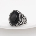 Retro stainless steel ring featuring a large oval black gemstone with vintage carvings - US 7 / Black Stone